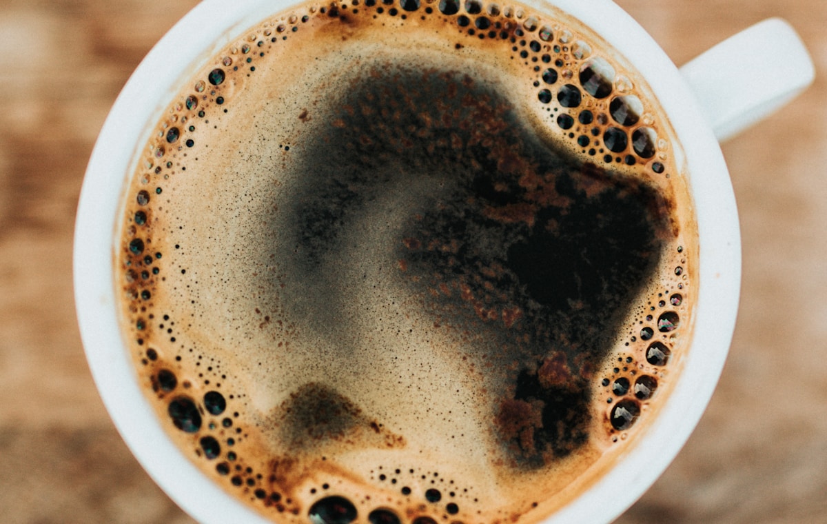 Coffee being poured into a cup